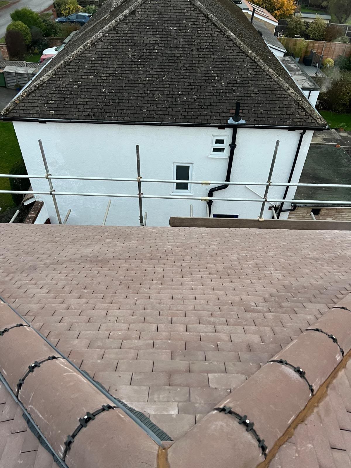 New roof structure with fresh rafters, battens and membrane during a full roof rebuild in North Wales